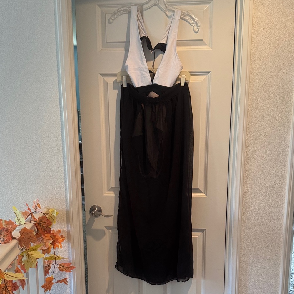 This new sheer bathing suit wraparound for beach wear or pool party vibes.